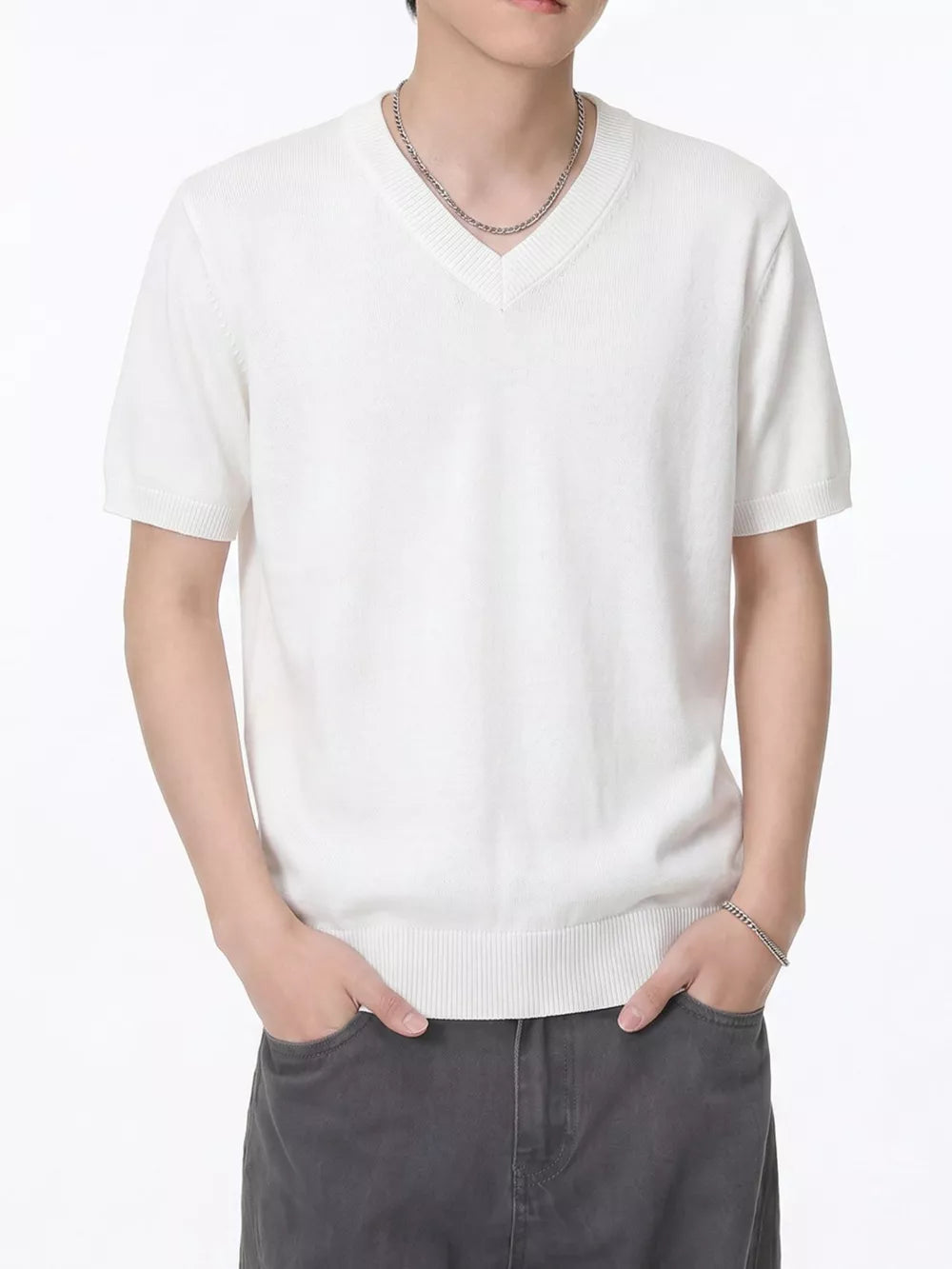Men's white V-neck knit t-shirt with short sleeves and ribbed trim.