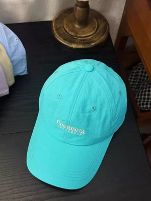 Sky blue cotton baseball cap with embroidered logo detail