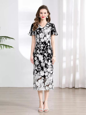 Black floral lace midi dress with V-neck and short sleeves.