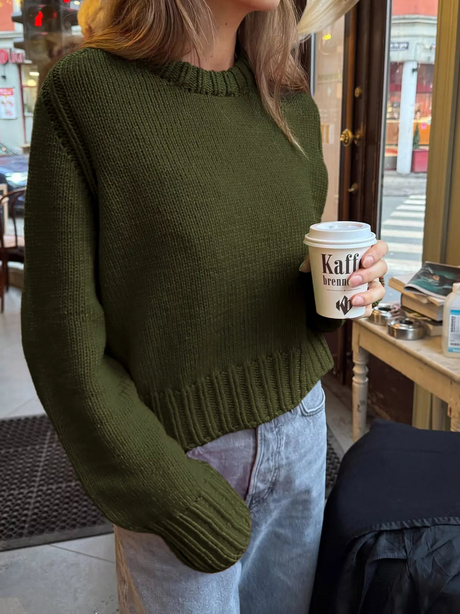 Army green ribbed round-neck acrylic knit sweater with a comfortable fit.