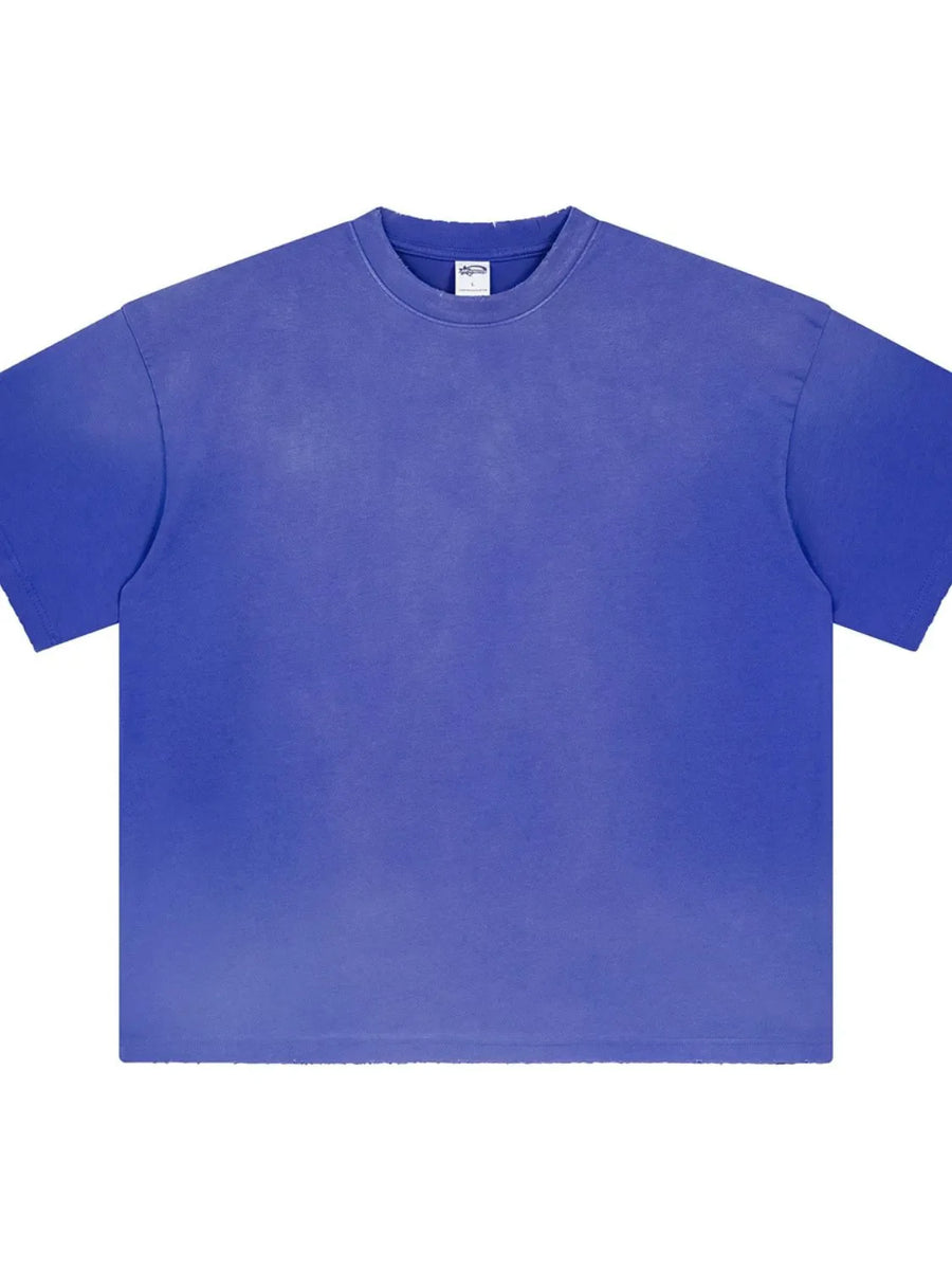 Oversized washed cotton crewneck tee in plum purple with distressed neckline.