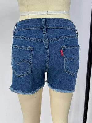 Classic blue denim shorts with frayed hem and button fly.