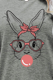 Heather gray t-shirt with a graphic of a bunny wearing heart glasses and a pink polka dot bandana, blowing a bubble.