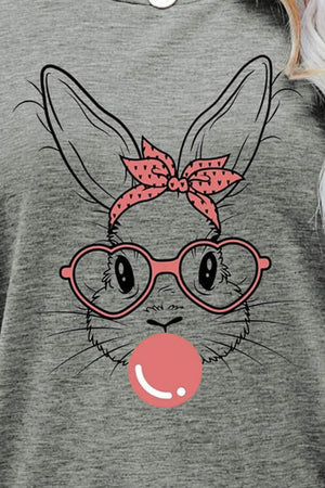 Heather gray t-shirt with a graphic of a bunny wearing heart glasses and a pink polka dot bandana, blowing a bubble.