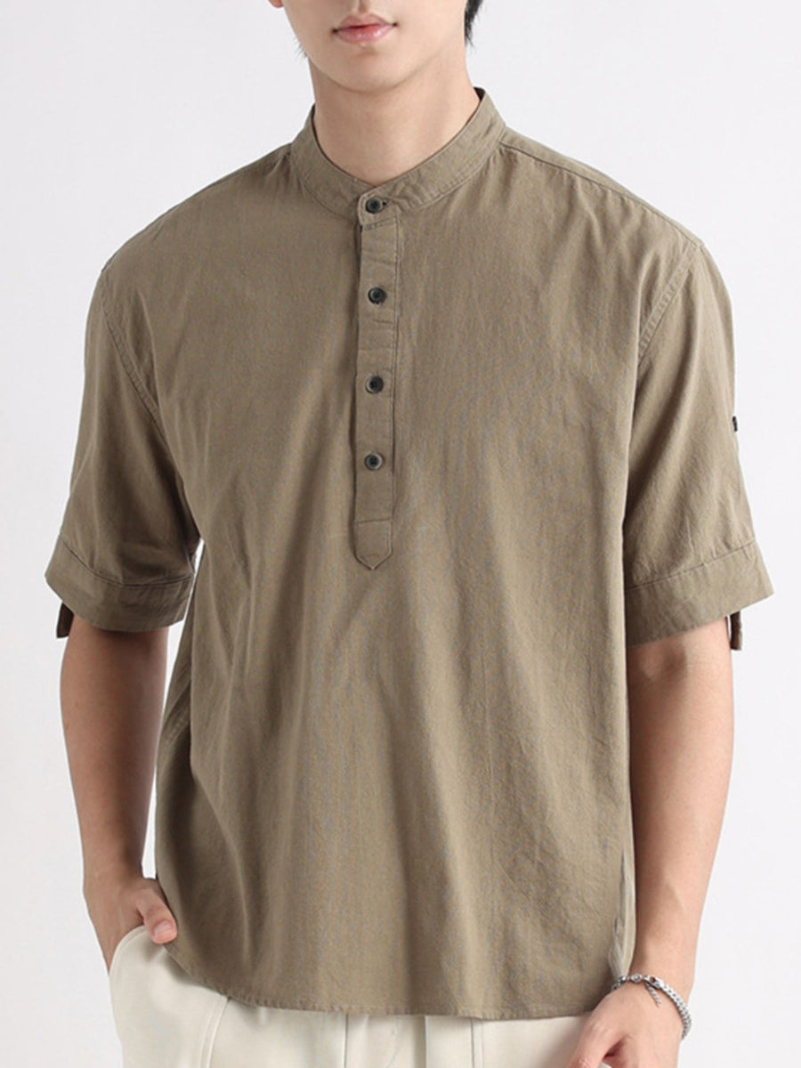 Men's olive band collar short sleeve button-down blouse with four buttons.