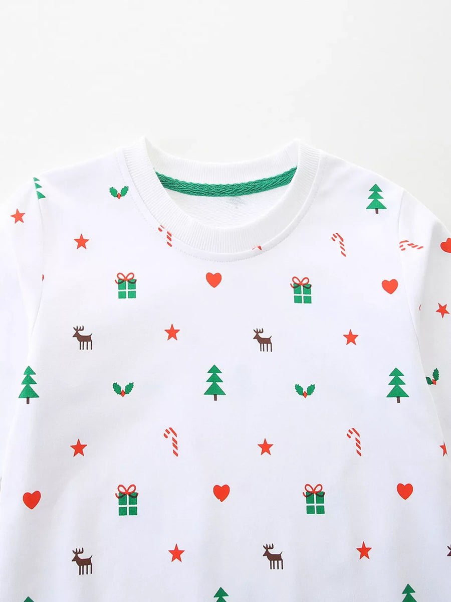White crew neck sweatshirt with Christmas print featuring trees, gifts, and reindeer.