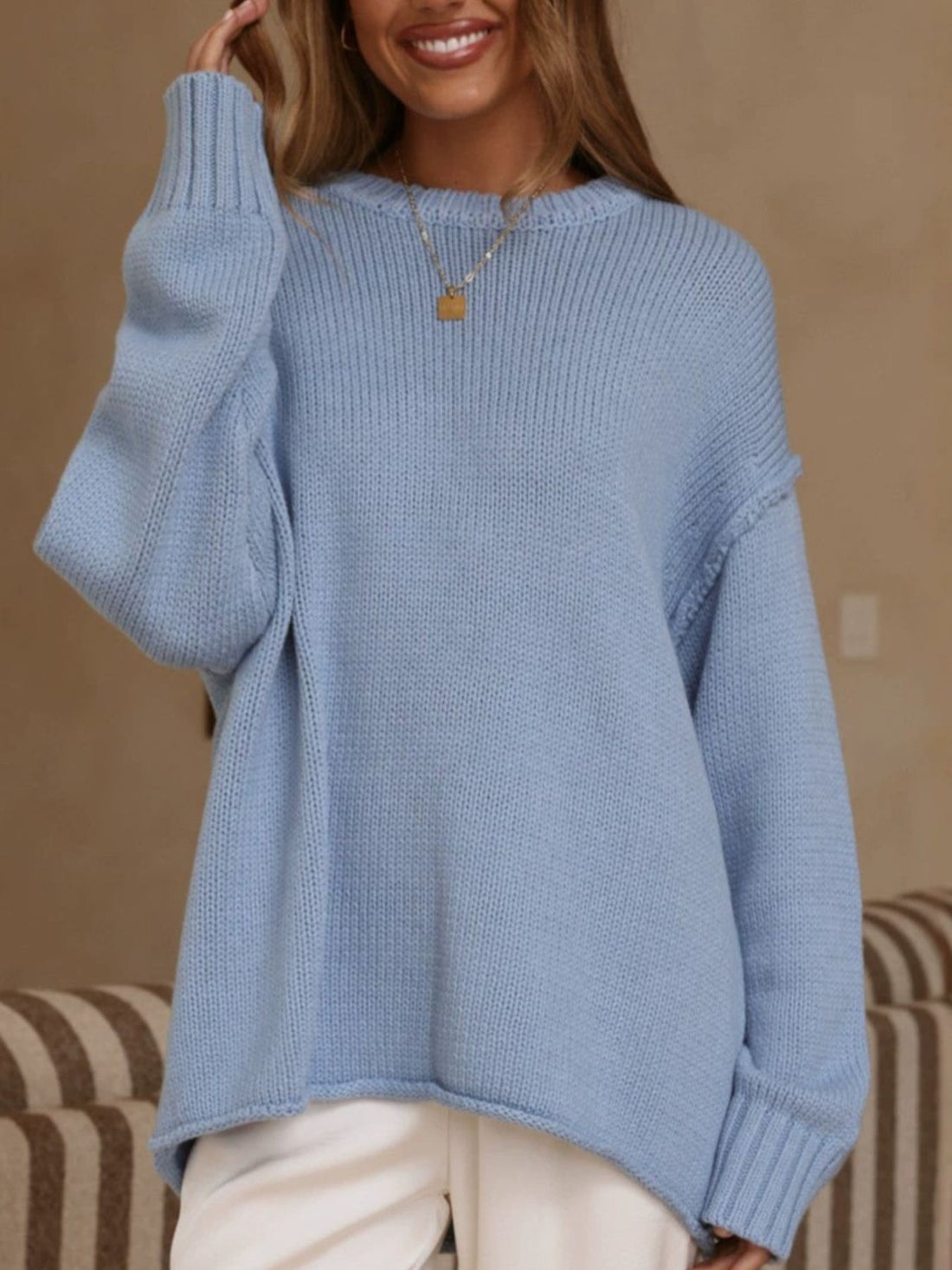 Black pullover sweater with hip-length and pullover