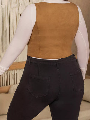 Caramel faux suede cropped vest with lace-up detail, worn over a white long-sleeve shirt.