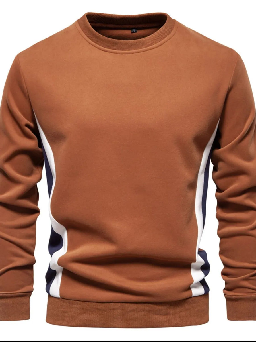 Terracotta crew neck sweatshirt with navy and white side panel detail.