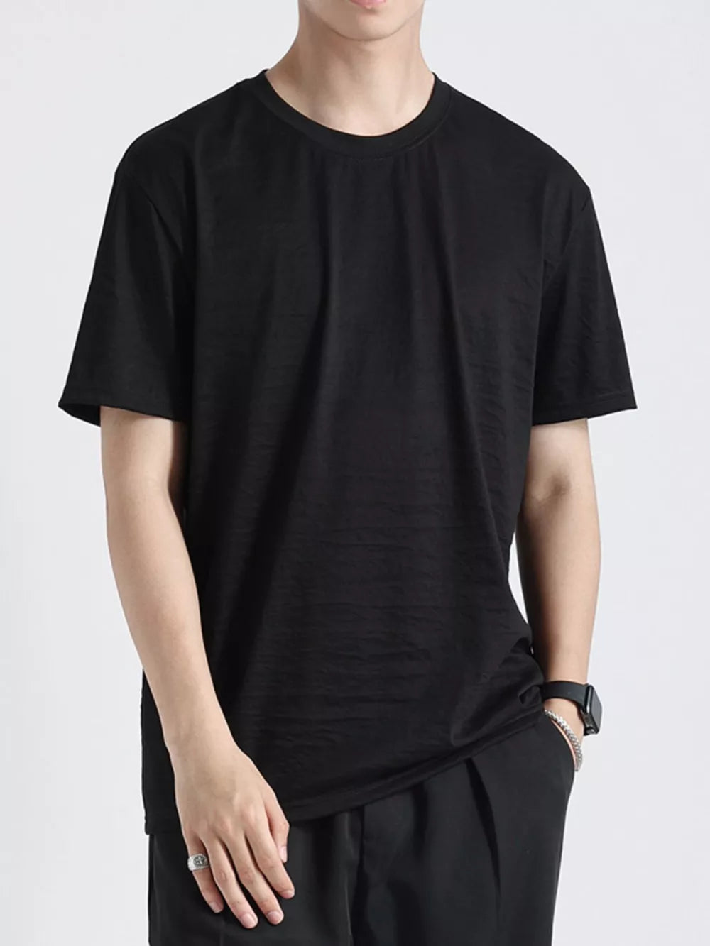 Men's black relaxed fit cotton t-shirt with crew neck and short sleeves.