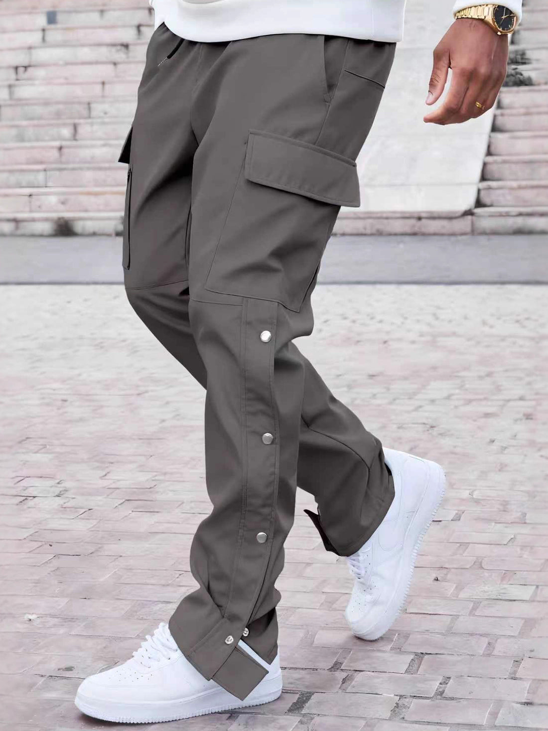 Black cargo pants with full-length and drawstring, snap