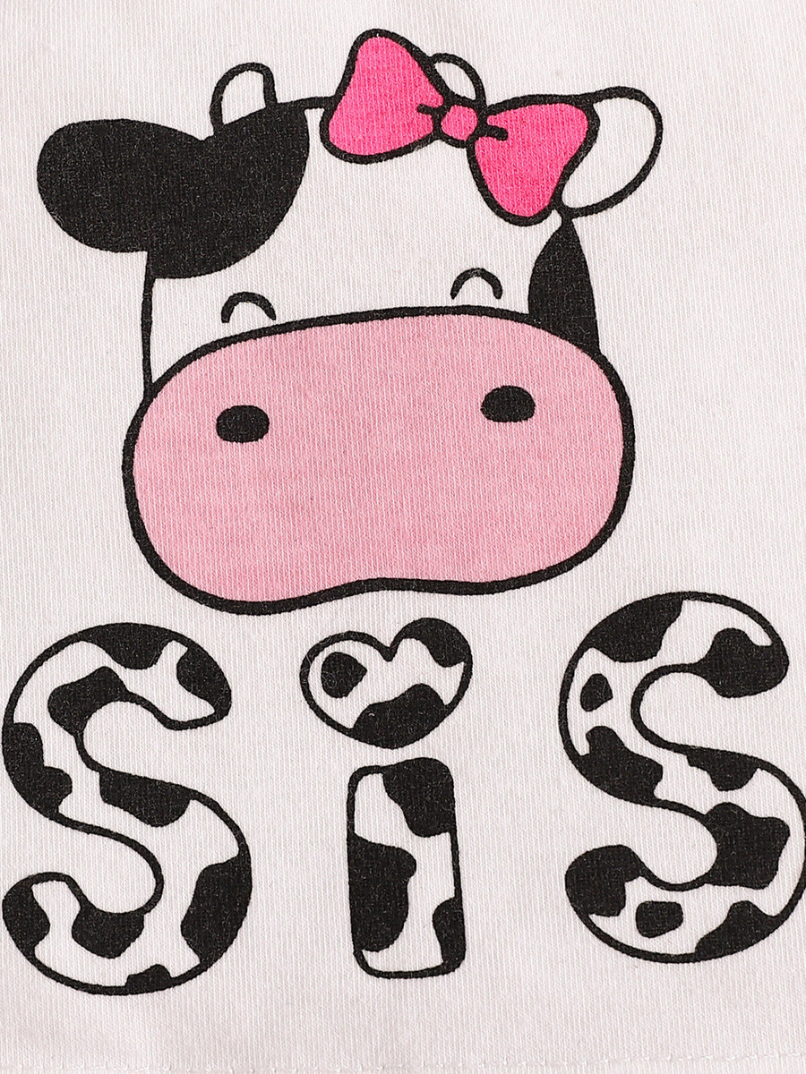 Baby cow print tank top with pink bow and "Sis" graphic on white cotton.