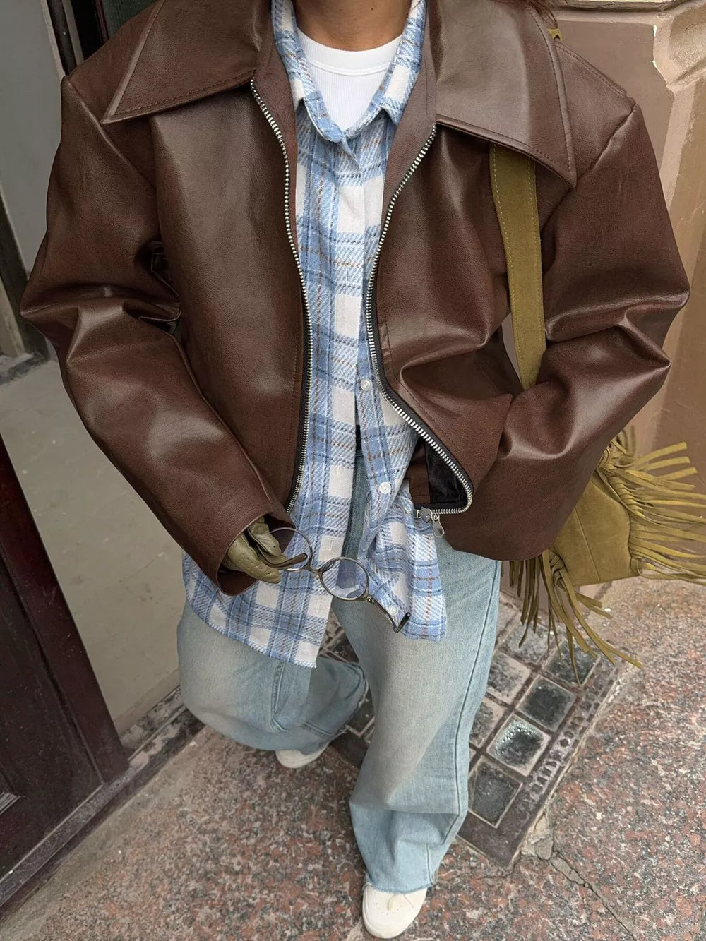 50% polyurethane, 50% polyester Care instructions: Machine wash cold bomber jacket in Brown with oversized silhouette