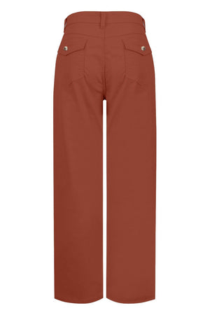 Rust wide-leg utility denim trousers with buttoned back pockets.