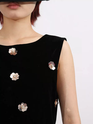 Black velvet sleeveless dress with floral sequin embellishments