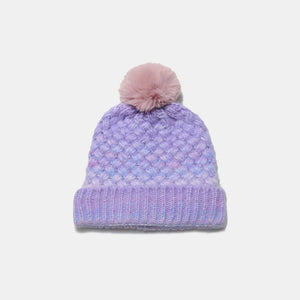 Textured ombre knit beanie in pastel blue with a pink pom.
