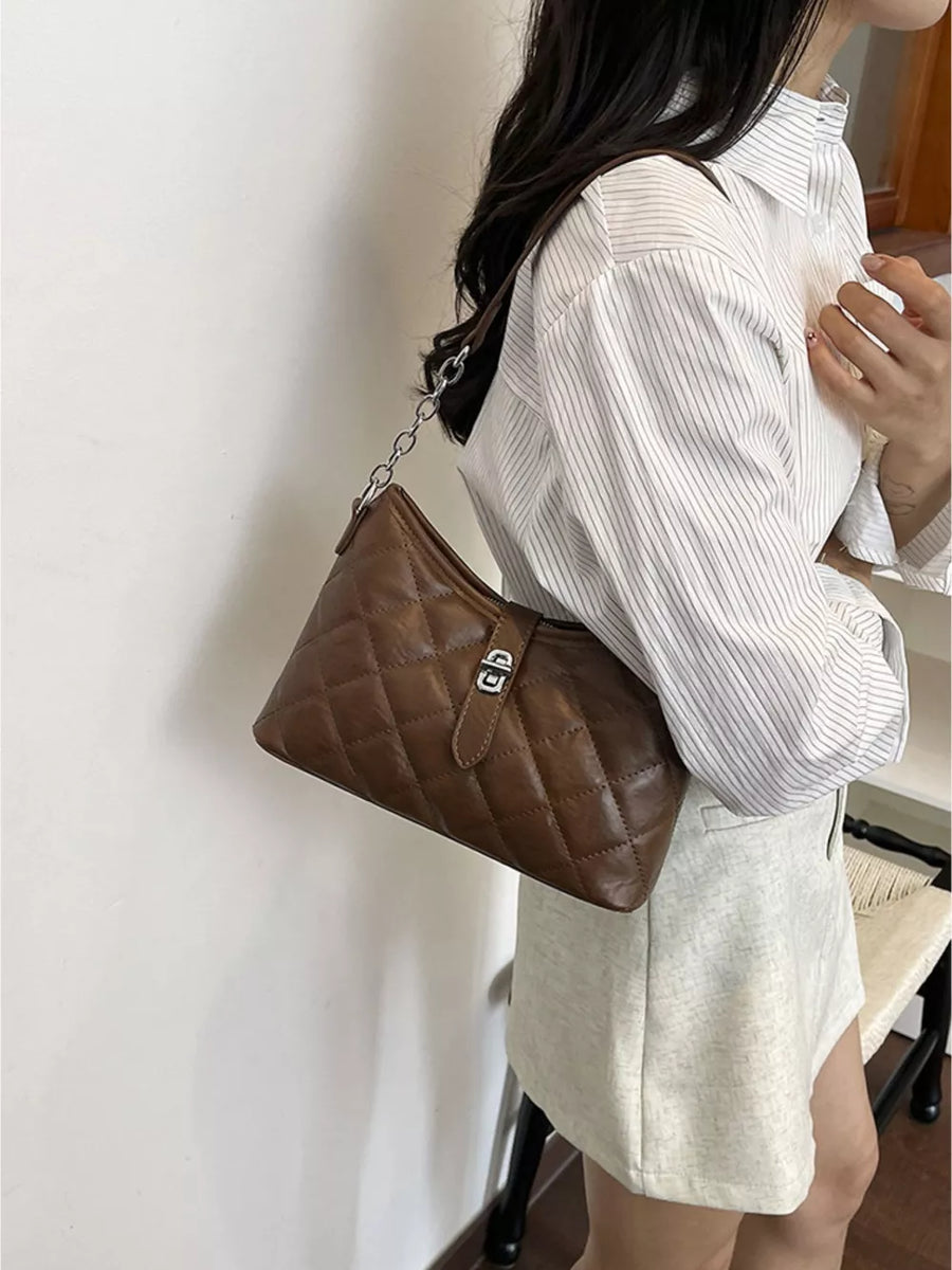 crossbody bag in Brown with quilted and quilted design