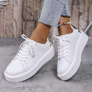 sneakers in white featuring platform sole and platform sneaker fit