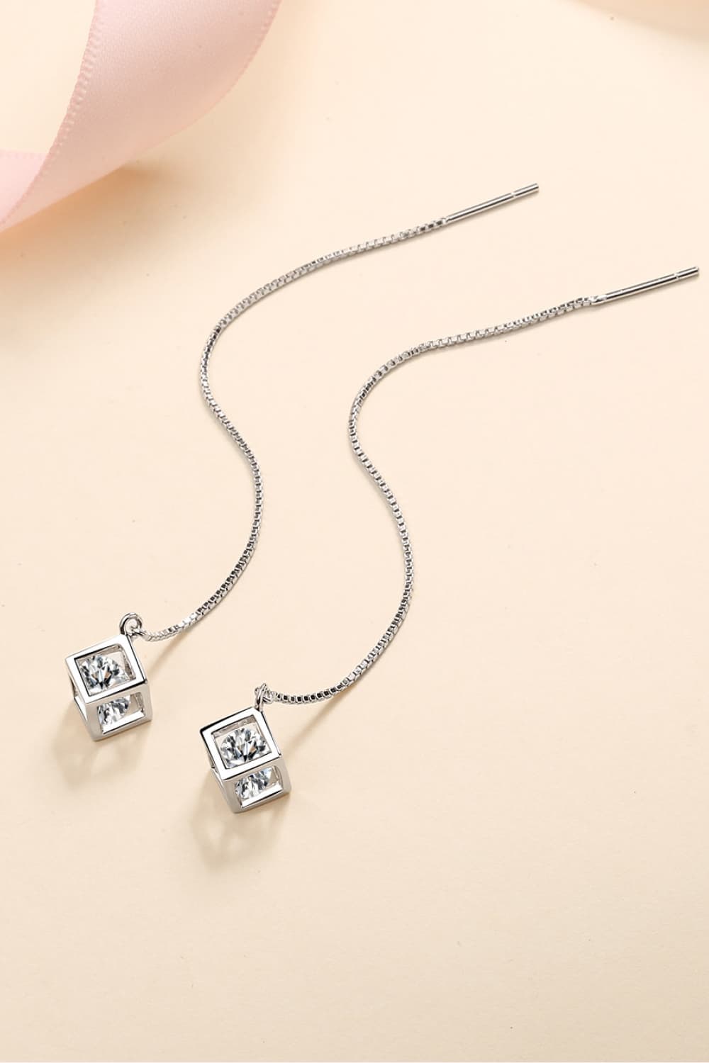 Silver threader earrings with clear cubic zirconia cube charms