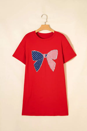 Red cotton mini dress with a sequined stars and stripes bow graphic.