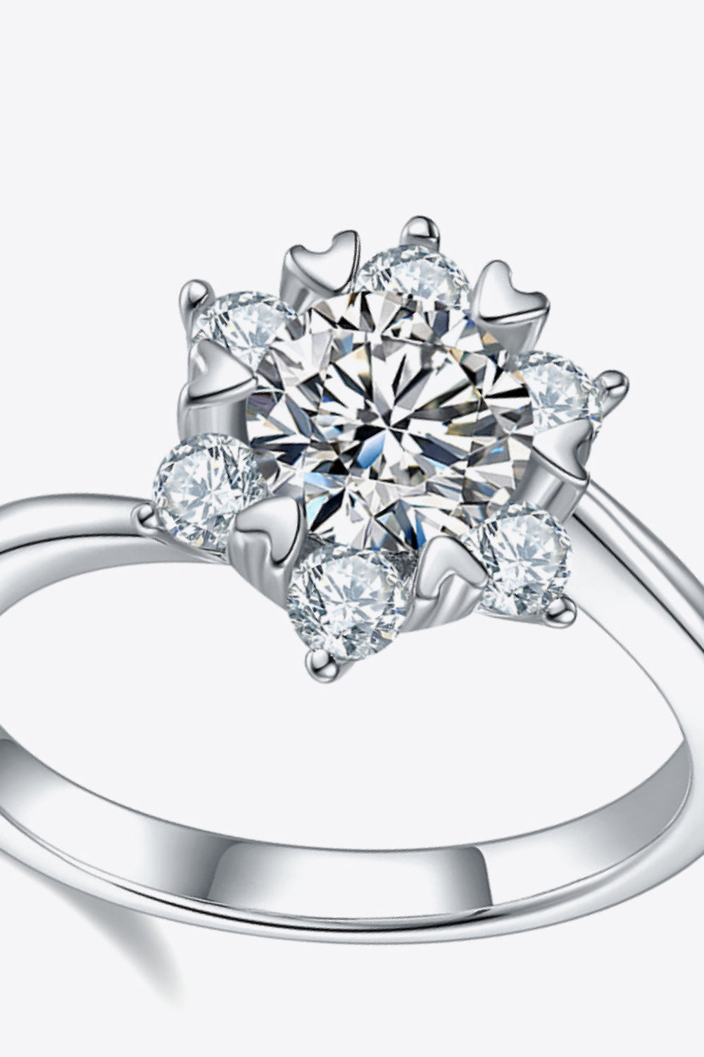 Silver floral cluster diamond ring in 925 sterling silver with sparkling stones.