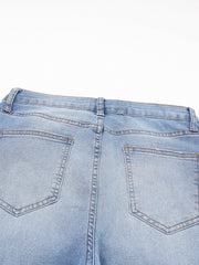 Light wash denim cropped jeans with whiskered details and back pockets.