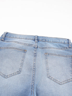 Light wash denim cropped jeans with whiskered details and back pockets.