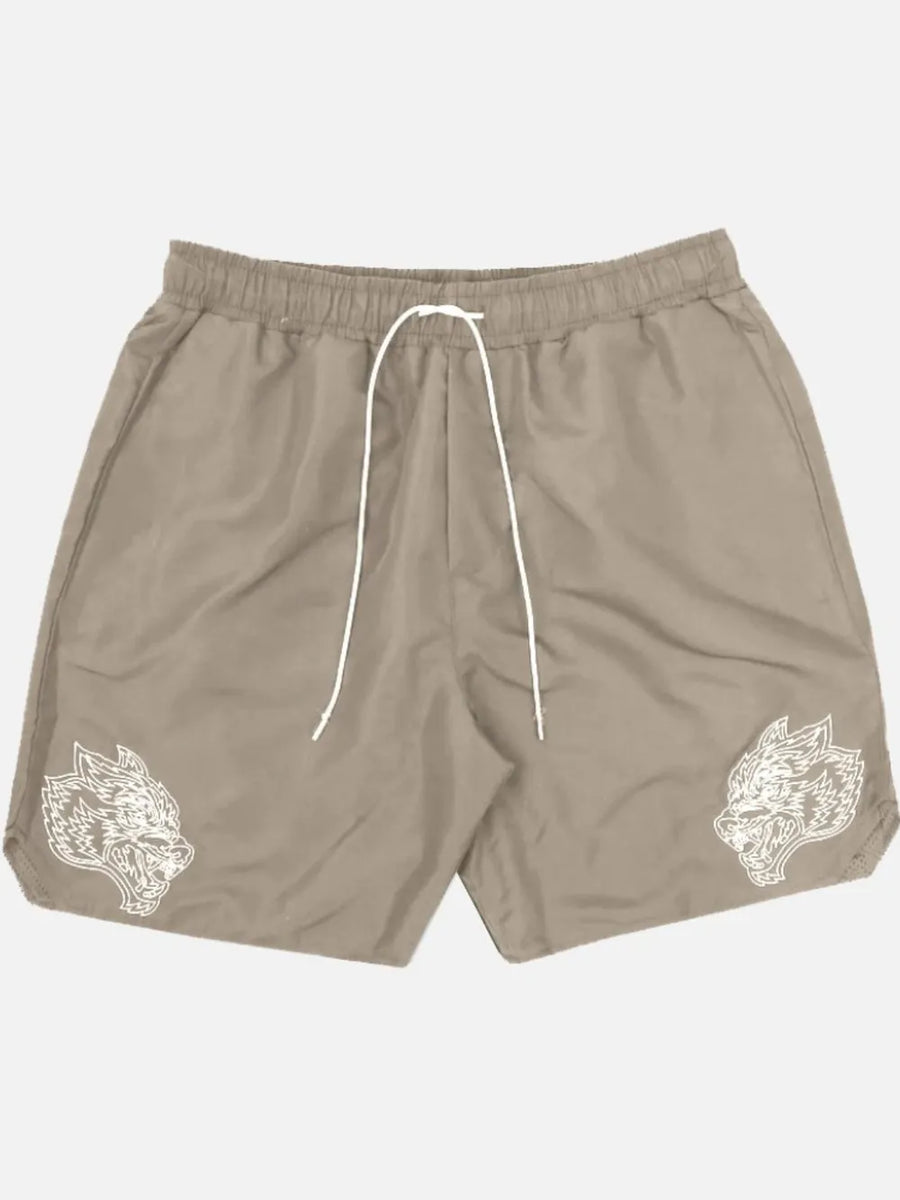 Khaki performance shorts with white embroidered wolf heads on both legs.