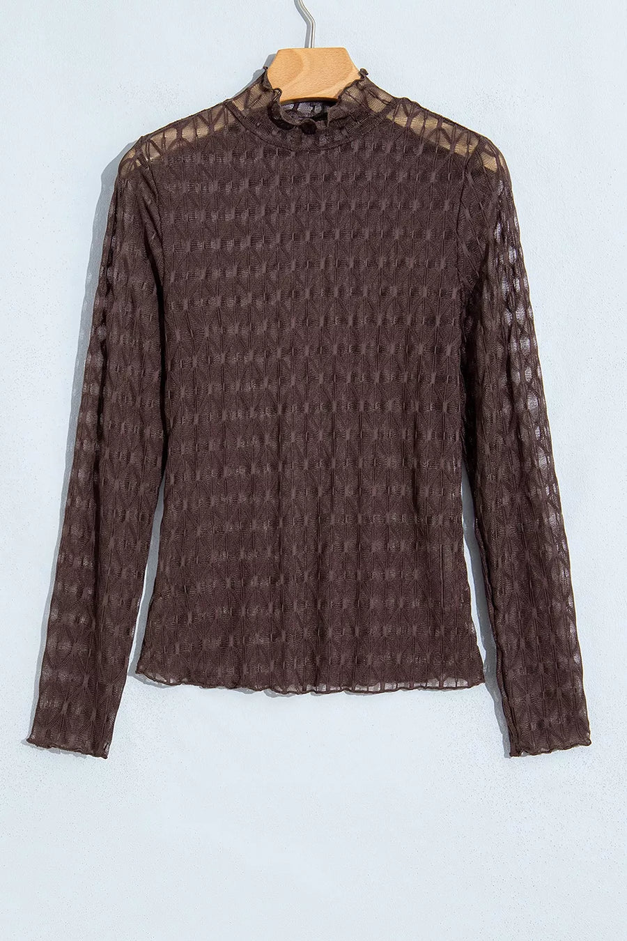 90% polyamide, 10% elastane Care instructions: Machine wash cold blouse in dark brown with fitted silhouette