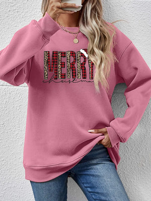 Blush Pink sweatshirt with "Merry Christmas" graphic featuring buffalo plaid and leopard print details.