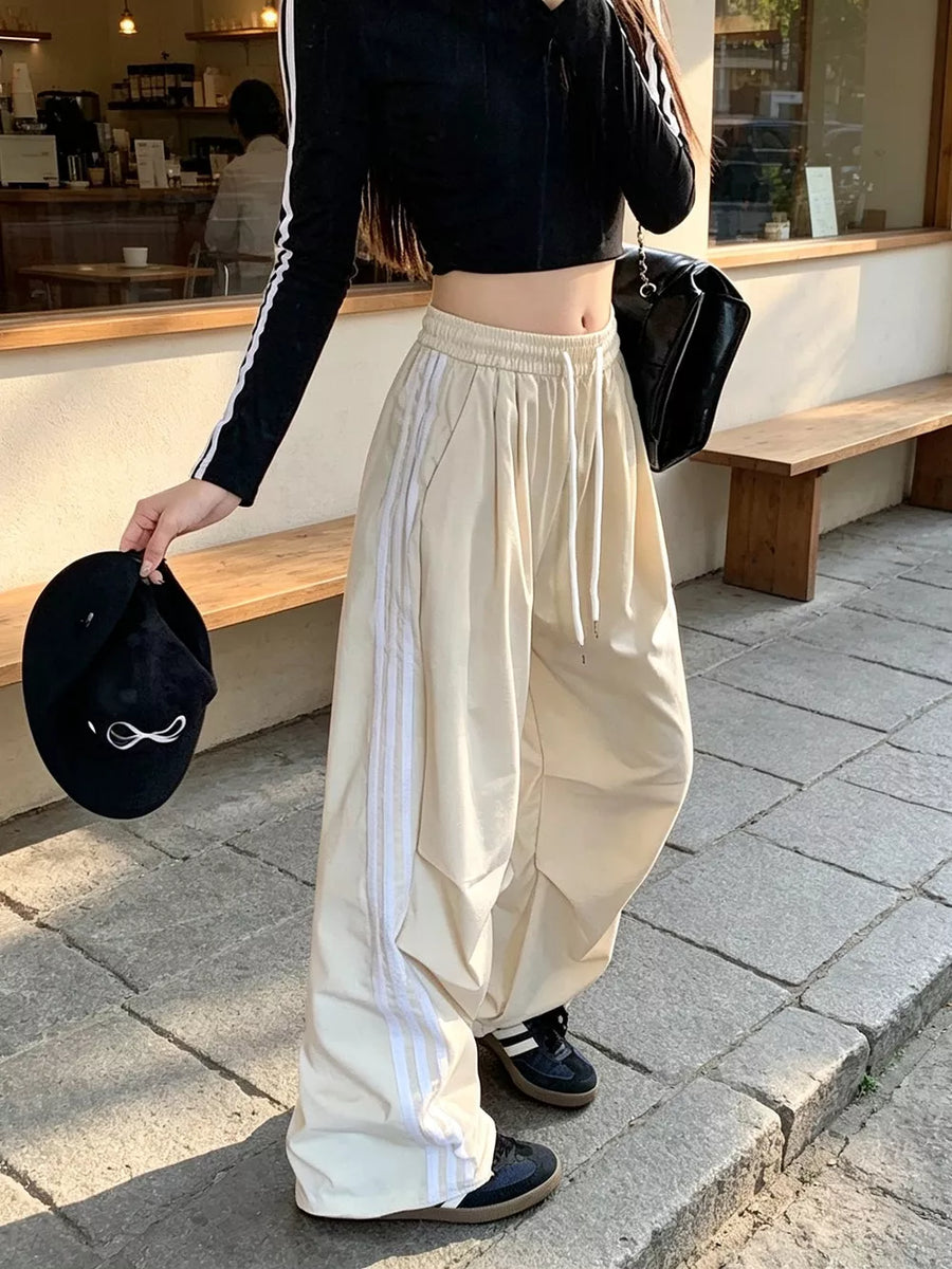 Beige wide-leg pants with full-length and drawstring