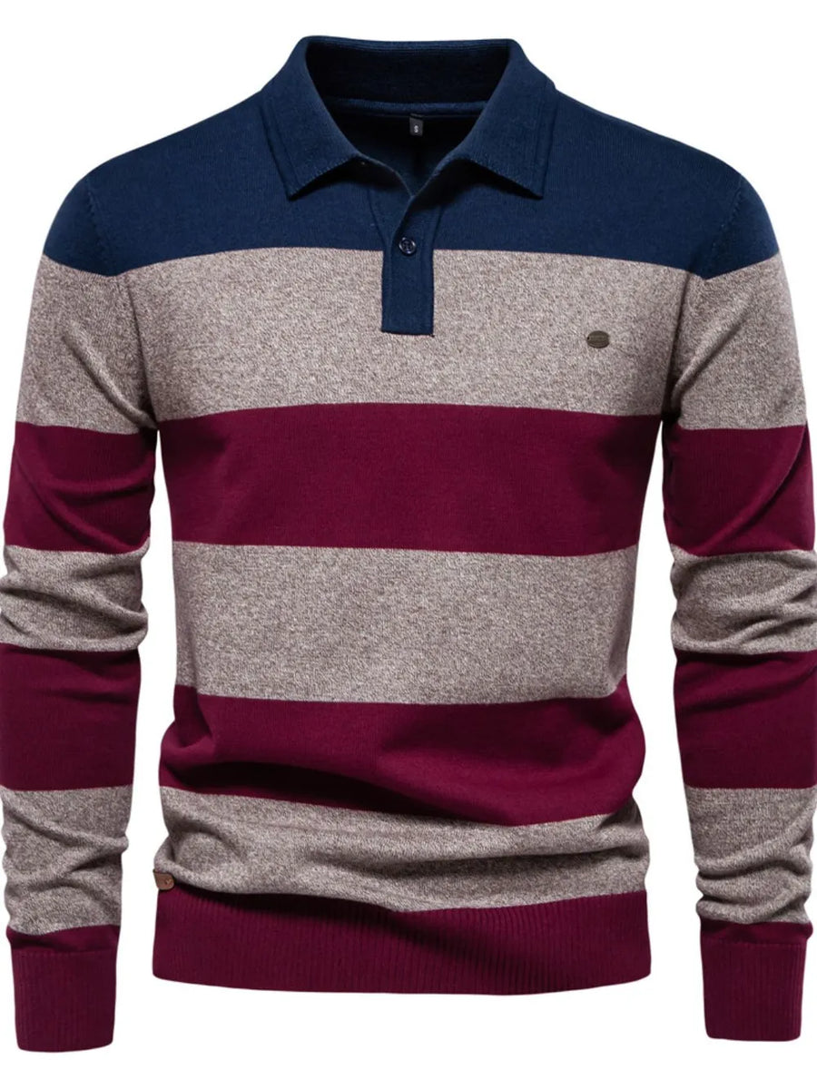 Colorblock knit polo with ribbed collar in navy, gray, and burgundy stripes.