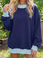 80% polyester, 20% viscose Care instructions: Machine wash cold sweatshirt in Navy with oversized silhouette