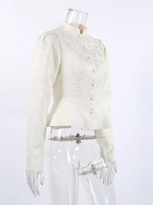 peplum top in ivory with floral and buttoned