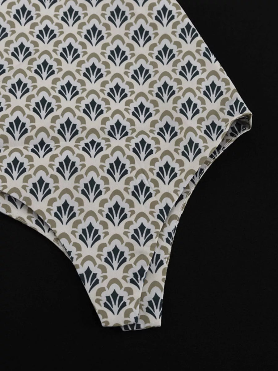 Thong with art deco fan pattern in cream, navy, and olive green