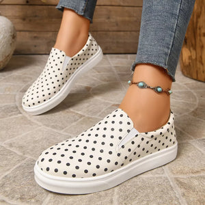 slip-on shoes in black with polka dot and elastic goring
