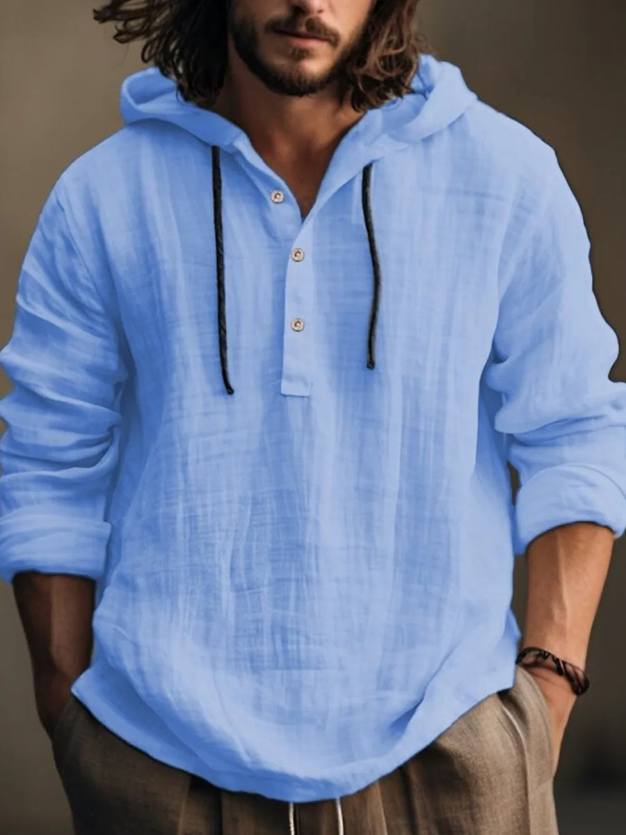 Light blue linen henley hooded pullover with button placket and drawstring.