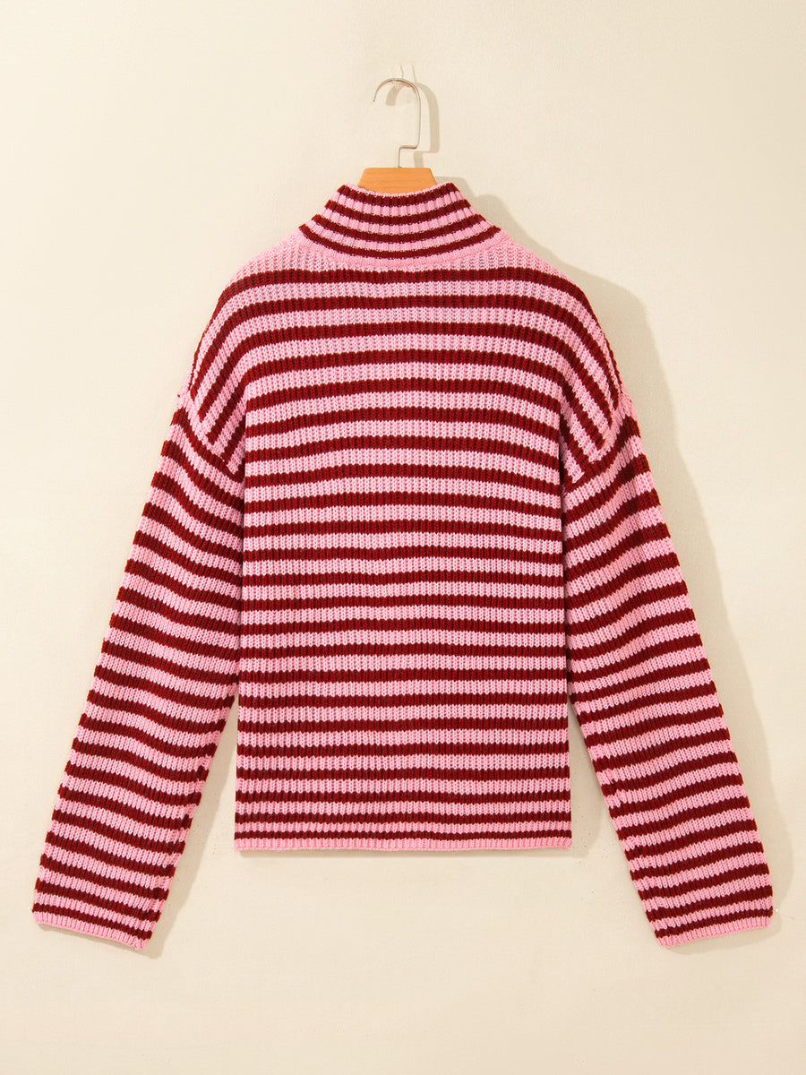 light pink zip-up sweater with hip-length and zip-front