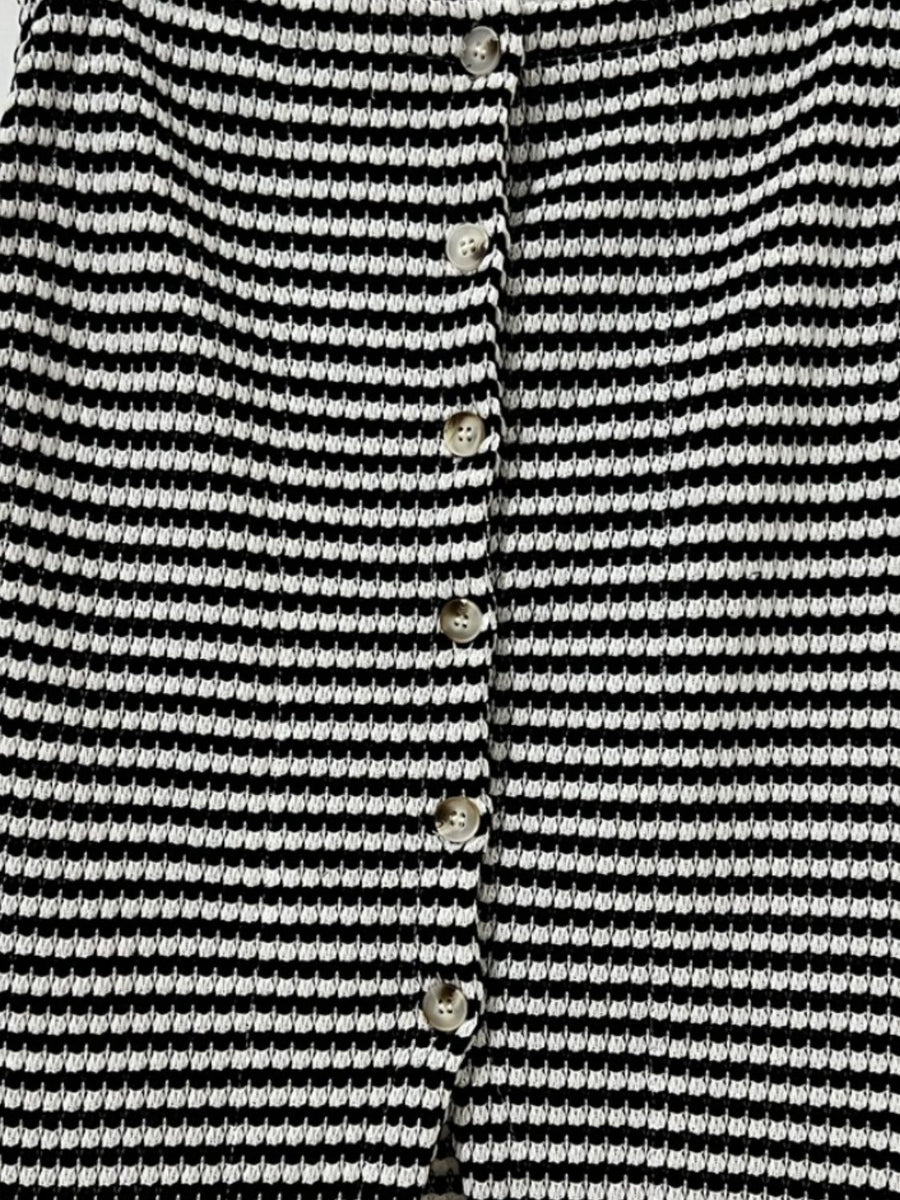 Textured stripe button-down tank top in black with a subtle waffle knit texture.