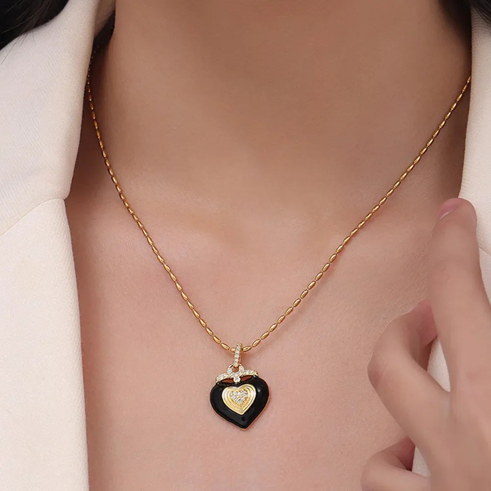Gold chain necklace with black enamel heart pendant and Czech diamonds