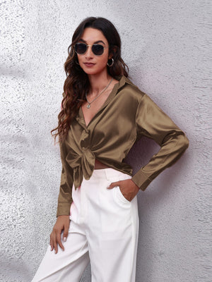 Taupe satin button-up shirt with a knotted front and collared neckline.