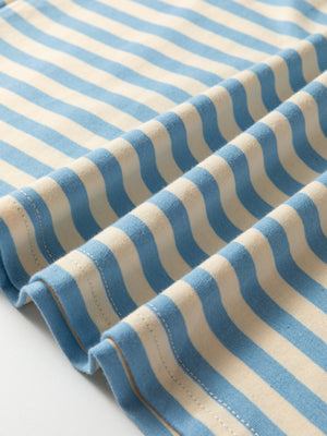 Striped round-neck t-shirt in light blue and cream cotton with elastane.