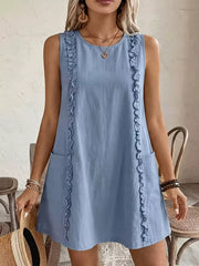 Light blue sleeveless dress with frill details and pockets.