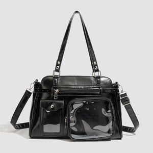handbag in black featuring multi-pocket and boxy fit