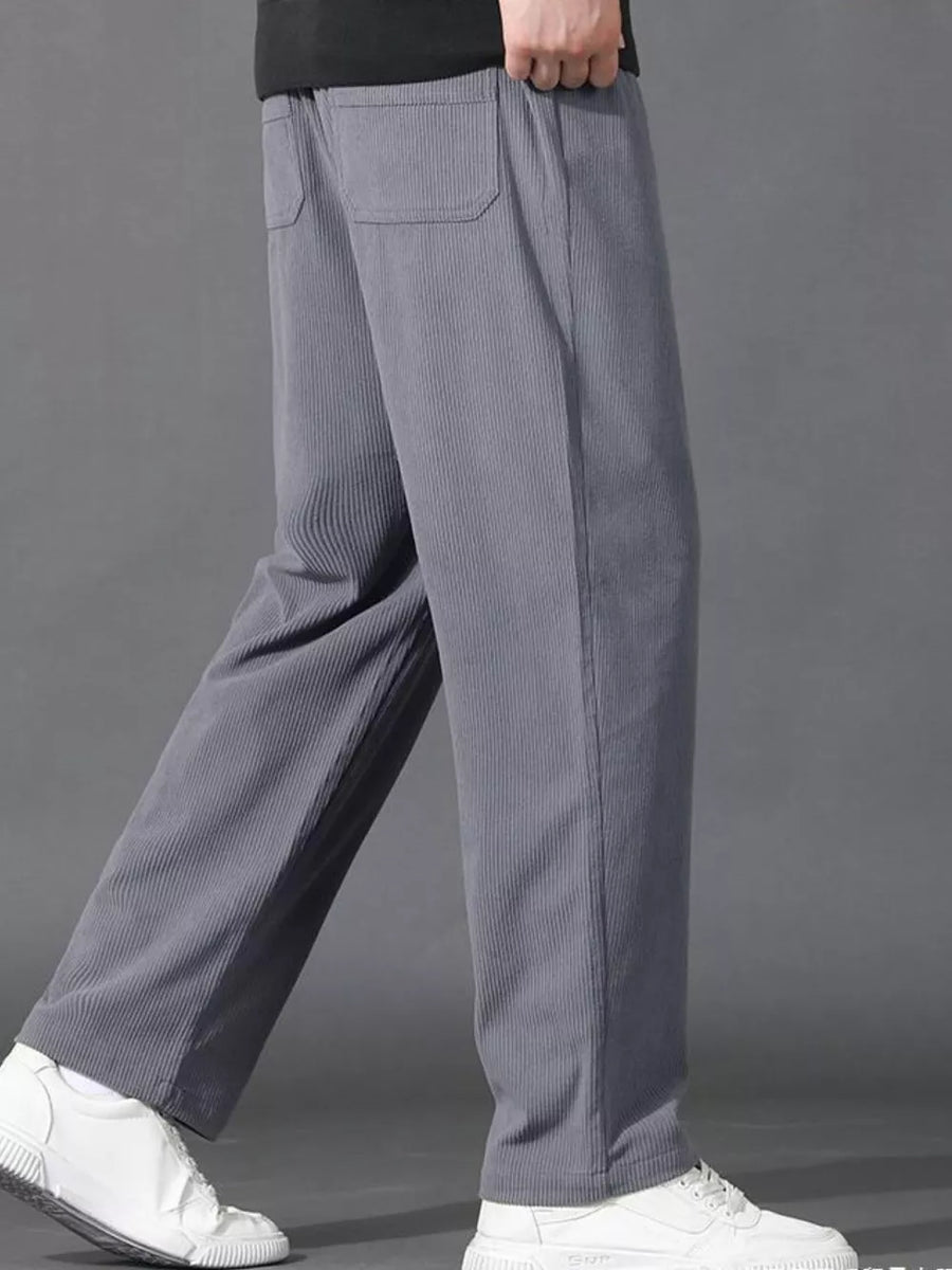 Light gray corduroy joggers with drawstring waist and back pocket detail.
