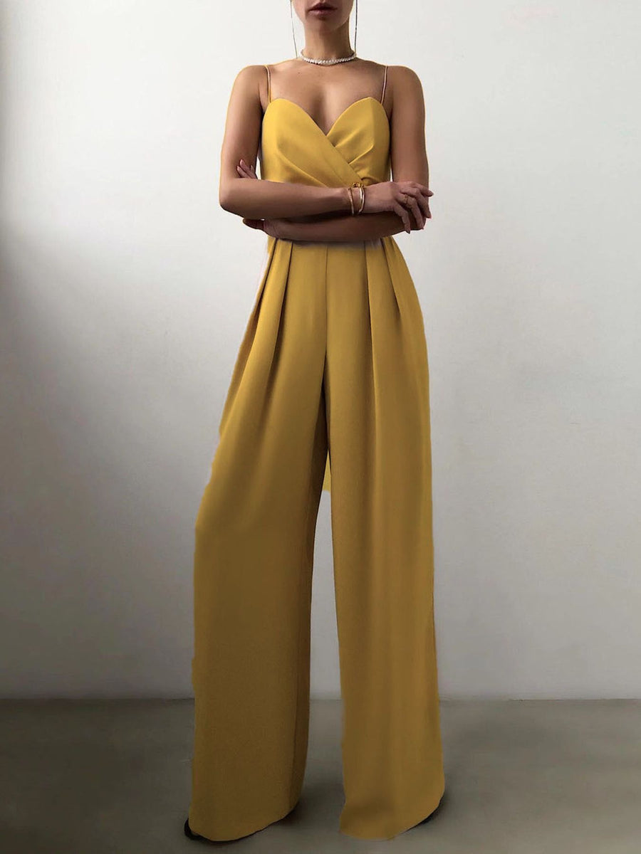 Yellow ruched spaghetti strap wide-leg jumpsuit with sweetheart neckline and pleated details.