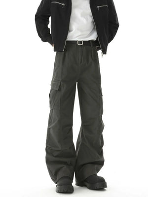 Relaxed fit utility cargo pants in dark gray with multiple pockets and a belted waist.