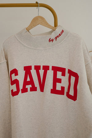 50% polyester, 50% cotton Care instructions: Machine wash cold sweatshirt in Light Gray with oversized silhouette