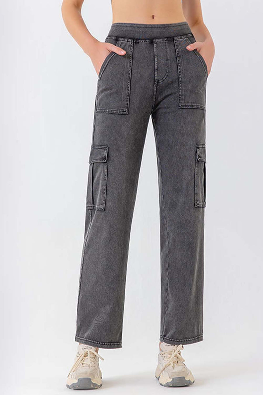 Utility denim cargo pants in gray with multiple pockets and a relaxed fit.
