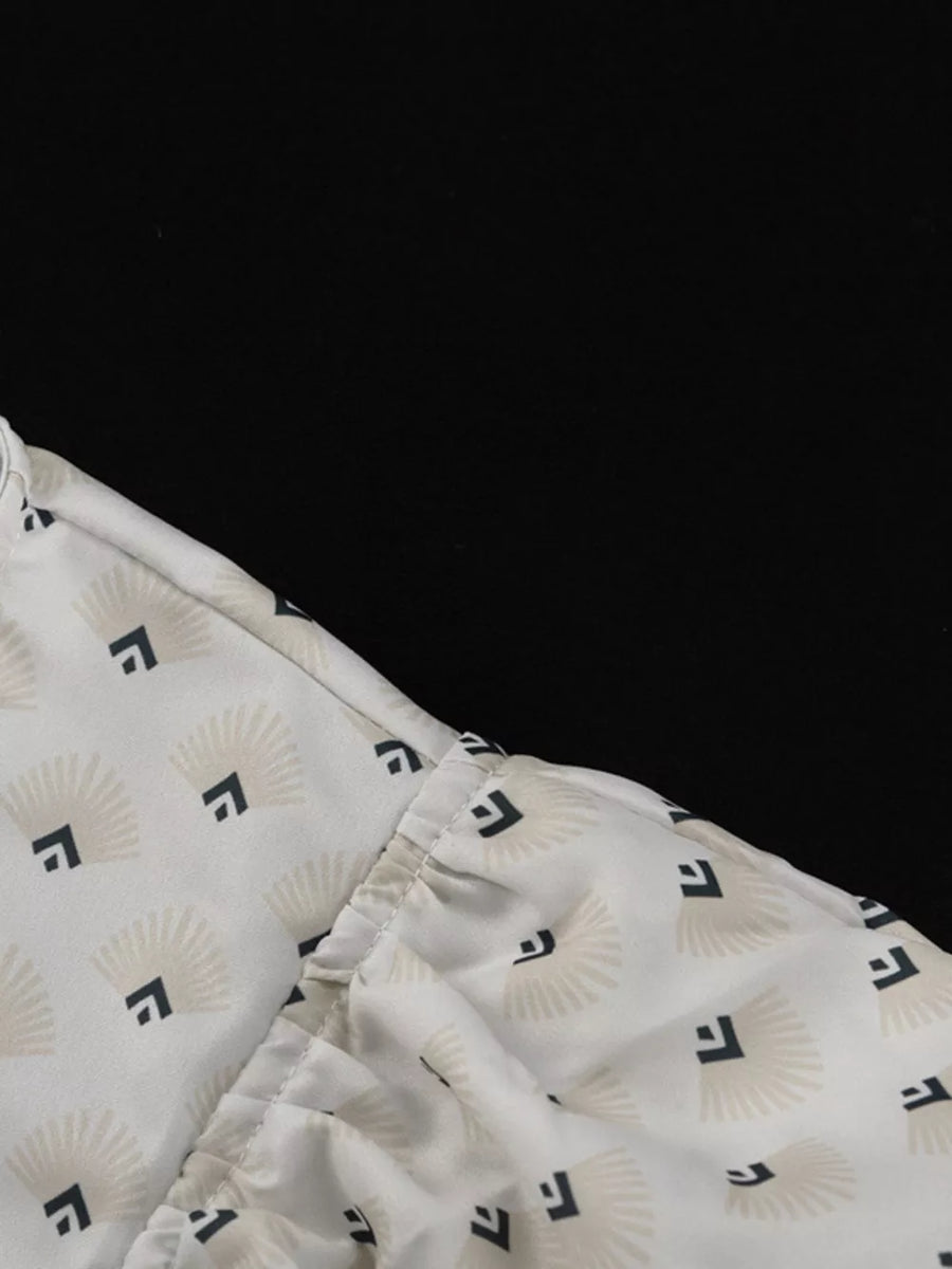 White blouse with fan and square pattern, gathered neckline detail